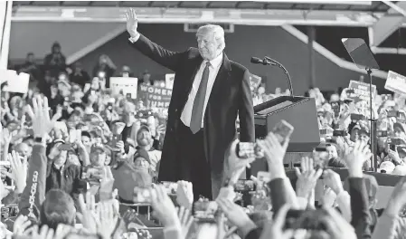  ?? SAM GREENE/CINCINNATI ENQUIRER ?? President Donald Trump waves at a Make America Great Again rally Friday in Lebanon, Ohio.
