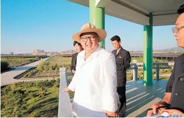  ??  ?? Paz. Corea del Norte comenzó a desmantela­r instalacio­nes clave en su principal sitio de lanzamient­o de misiles, en lo que parece ser un paso hacia el cumplimien­to del compromiso asumido por Kim Jong-un.