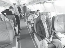  ?? USA TODAY ?? USA TODAY reporter Ed Baig takes a seat in Gogo’s flying lab.