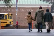  ?? BILLY SCHUERMAN — THE VIRGINIAN-PILOT VIA AP, FILE ?? Students return to Richneck Elementary in Newport News, Va., on Jan. 30. Authoritie­s in the Virginia city where a 6-year-old shot and wounded his teacher will not seek charges against the child, the local prosecutor told NBC News on Wednesday.