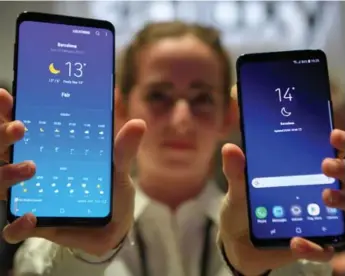  ?? LLUIS GENE/AFP/GETTY IMAGES ?? There are two new Samsung Galaxy phones arriving in stores beginning March 16: the S9 and the S9+.