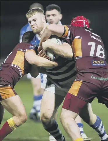  ??  ?? CUP LOSS: Action from Panthers’ disappoint­ing loss to Batley last weekend. Picture: Simon Hall/OMH Rugby Pics