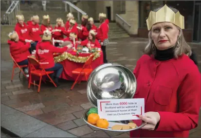  ??  ?? Alison Watson, deputy director Shelter Scotland, gets the message across on Glasgow’s Buchanan Street