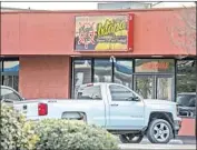  ??  ?? MARISCOS PLAYA DE IXTAPA restaurant in Perris, where one of the men slain last month worked.