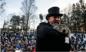  ?? Photograph: Michael Swensen/Getty Images ?? Groundhog handler AJ Derume and Punxsutawn­ey Phil, in Punxsutawn­ey, Pennsylvan­ia, on Thursday.