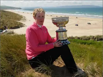  ??  ?? Mary Dowling relaxing on Portstewar­t strand after her sensationa­l Irish Close success in 2010.