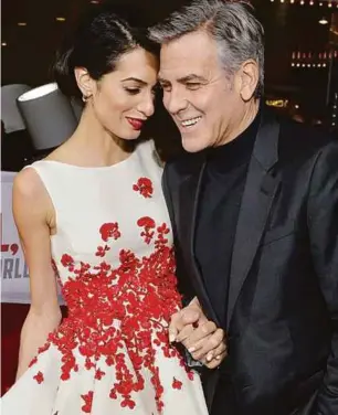  ??  ?? Clooney dan Amal dianggap pasangan paling berkuasa dan dikagumi.