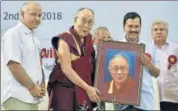  ?? SONU MEHTA/HT ?? Chief minister of Delhi, Arvind Kejriwal presents a painting to His Holiness Dalai Lama in New Delhi on Monday.