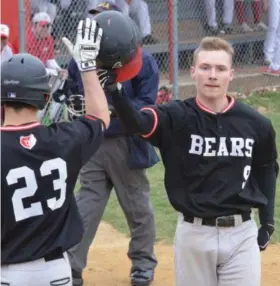  ?? THOMAS NASH — DIGITAL FIRST MEDIA ?? Boyertown’s Austyn Young-Levengood, right, celebrates with Quinn Mason (23) after hitting a home run during the first inning of Friday’s game.