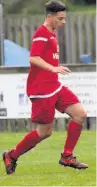  ?? Paul Watson ?? Matty Waters in action for Runcorn Town in the clash with Barnoldswi­ck Town at the Silentnigh­t Stadium last Saturday. The young full-back is on loan for a month from Chester FC.