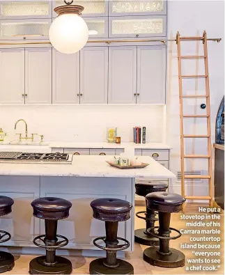  ??  ?? He put a stovetop in the
middle of his Carrara marble
countertop island because
“everyone wants to see a chef cook.”