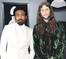  ?? EVAN AGOSTINI/THE ASSOCIATED PRESS ?? Donald Glover, a.k.a. Childish Gambino, left, and Ludwig Göransson collaborat­ed on This Is America.