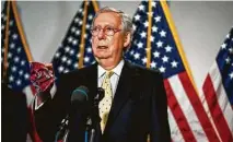  ?? Anna Moneymaker / New York Tiimes ?? Senate Majority Leader Mitch McConnell addresses reporters following a luncheon Tuesday in Washington.