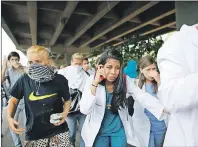  ?? AP PHOTO ?? Demonstrat­ors run away from tear gas during an anti-government protest in Caracas, Venezuela, Monday. At least 46 people have died during the two-month anti-government protest movement.