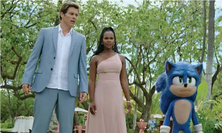  ?? Photos courtesy paraMount pictures and sega of aMerica ?? ‘QUITE REMARKABLE’: From left, James Marsden, Tika Sumpter and Sonic, voiced by Ben Schwartz, are seen in ‘Sonic the Hedgehog 2.’