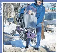  ??  ?? IT’S ‘SLOW’
REMOVAL: The Vincent family (below) had some fun sledding in Dumbo on Friday — but other New Yorkers were frustrated that the city hadn’t cleared the snow from sidewalks a day after the massive storm. Here (left), Rocco Lattorre has to...