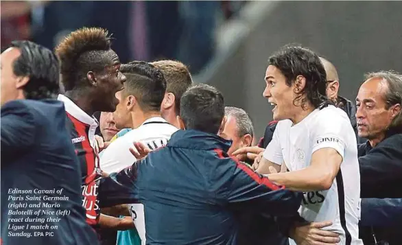  ?? EPA PIC ?? Edinson Cavani of Paris Saint Germain (right) and Mario Balotelli of Nice (left) react during their Ligue 1 match on Sunday.