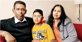  ?? ?? Malwattege Peiris (right) with her husband, Sumith Kodagoda Ranasingha­ge and her son, Kevin. Photograph: Graeme Robertson/The Guardian