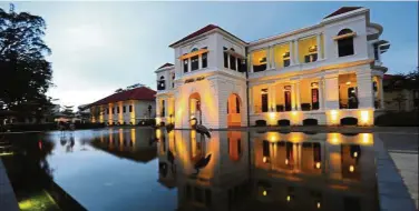  ?? — AZRAIE AZAHARI/whwdesign.org ?? The restored Muzium Sultan Abu Bakar. A shallow infinity pool and water fountain for children replaced the hot tarmac of a car park in front of the building.