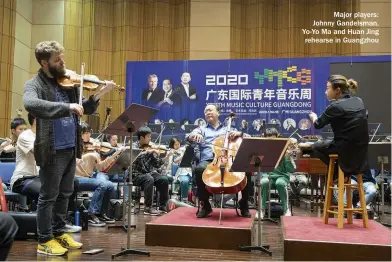  ??  ?? Major players: Johnny Gandelsman, Yo-yo Ma and Huan Jing rehearse in Guangzhou