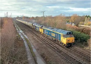  ?? CHRIS MILNER ?? December 4 last year saw a run of double-headed Class 50s. Seen approachin­g Stenson Junction No. 50007 Hercules, running on one side as No. 50034 Furious, worked with No. 50049 Defiance at the head of Pathfinder’s ‘Christmas White Rose’ from Cardiff to York.