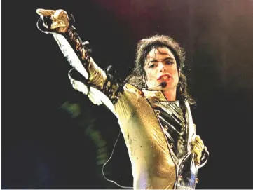  ??  ?? Jackson performs during concert in Vienna, on July 2, 1997. — Reuters file photo