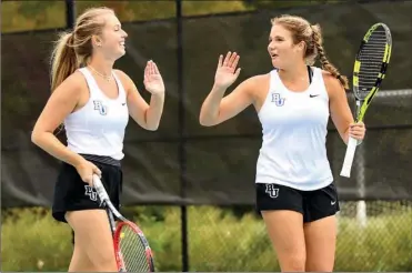  ?? PHOTO COURTESY OF BETHEL UNIVERSITY ?? Plymouth’s Kyla Heckaman (right) played both singles and doubles for Bethel University’s women’s tennis team this fall.