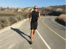  ?? SANDY LABRINOS-OWENS ?? Robert Owens, 66, is training for the World Marathon Challenge, where competitor­s wake up on a new continent each day and “start running.”