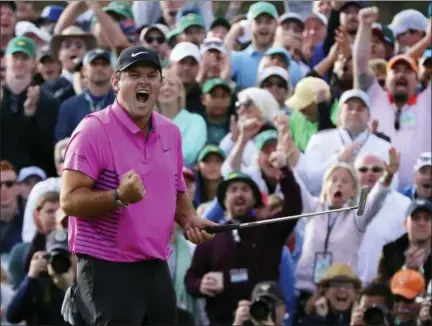  ?? CURTIS COMPTON — ATLANTA JOURNAL-CONSTITUTI­ON VIA AP ?? Patrick Reed celebrates after winning the Masters golf tournament Sunday in Augusta, Ga.