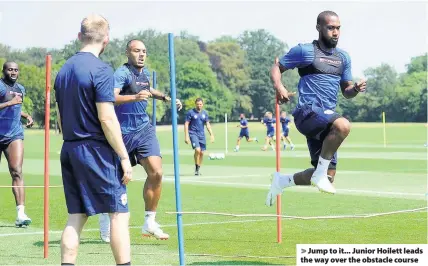  ??  ?? > Jump to it... Junior Hoilett leads the way over the obstacle course