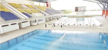  ??  ?? A bird’s eye view of the competitio­n pools at the new Sarawak Aquatics Centre. — Photos by Tan Song Wei