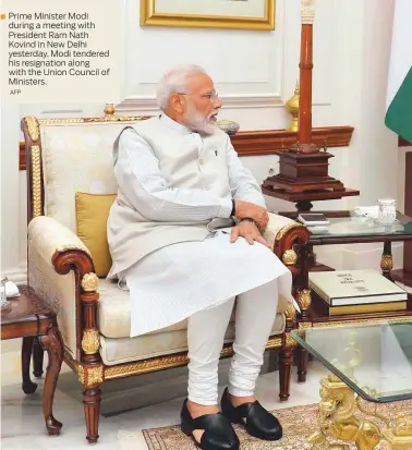  ?? AFP ?? Prime Minister Modi during a meeting with President Ram Nath Kovind in New Delhi yesterday. Modi tendered his resignatio­n along with the Union Council of Ministers.