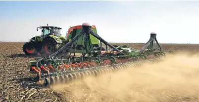  ?? Picture: Getty. ?? A tractor sowing soya, a common replacemen­t for animal protein in certain foods.