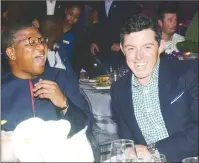  ??  ?? GOOD TIMES . . . South African Sports Minister Fikile Mbalula (left) shares a lighter moment with world number two golfer, Rory Mcllroy, in Johannesbu­rg this week ahead of the South African Open which tees off this morning