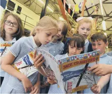  ??  ?? Grangetown Primary pupils with Liz Million’s Jack Crawford book at Sunderland Maritime Heritage.