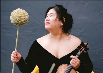  ?? KRISTEN LOKEN — CALIFORNIA SYMPHONY ?? California Symphony concertmas­ter Jennifer Cho is thrilled to be performing Lou Harrison's “Concerto for Violin with Five Percussion­ists.” “It's been on my wish list for a while,” Cho said about the performanc­e set for the weekend.