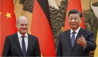  ?? ?? FILE - German Chancellor Olaf Scholz, left, meets Chinese President Xi Jinping at the Great Hall of People in Beijing, China, Friday, Nov. 4, 2022.