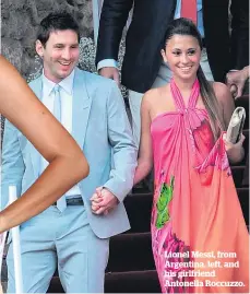  ??  ?? Lionel Messi, from Argentina, left, and his girlfriend Antonella Roccuzzo.