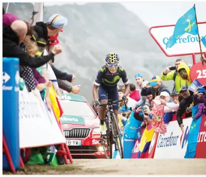  ??  ?? BACK ON TRACK: Nairo Quintana close to the finish line to win during the 10th stage of the 71st edition of "La Vuelta" Tour of Spain, a 188,7km route between Lugones to Lagos de Covadonga on Monday. (AFP)