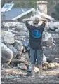  ?? Brian van der Brug L.A. Times ?? A MAN looks over the wreckage of a home caused by the Montecito mudslide in January.