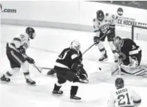  ?? April Gamiz, The Morning Call ?? Penn State goalie Peyton Jones blocks a shot by a Denver player during a Midwest Regional semifinal game Saturday night in Allentown, Pa.