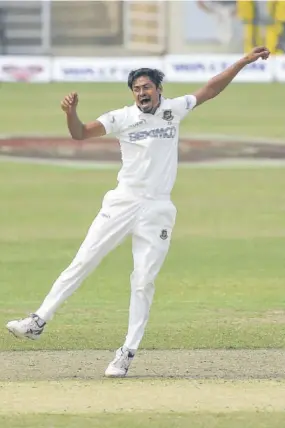  ??  ?? Bangladesh’s Taijul Islam celebrates after the dismissal of West Indies batsman John Campbell.