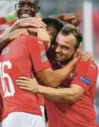  ?? EPA PIC ?? Switzerlan­d's Albian Ajeti (left) and Xherdan Shaqiri celebrate scoring during their Nations League match against Iceland.