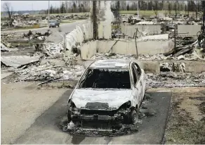  ?? LARRY WONG ?? The Alberta government says Fort McMurray residents are leading the effort to clean up their fire-ravaged city.