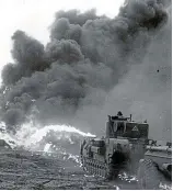  ??  ?? Terrifying: The flamethrow­er of a Churchill tank in Bovington, Dorset