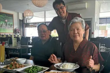  ??  ?? Whangarei restaurant owner Charn Tiebtienra­t, pictured left with parents Thamrong and Anong, knows small business owners who earn less than the minimum wage while, right, Bella Walters struggles by on a minimum wage.