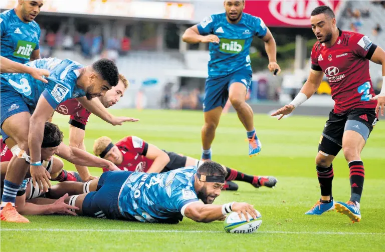  ?? Photo / Photosport ?? Patrick Tuipulotu gave his side the lead with this try but the Blues otherwise struggled to create scoring opportunit­ies against the Crusaders at Eden Park last night.