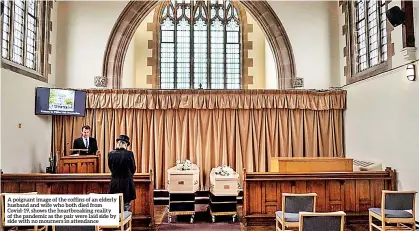  ??  ?? A poignant image of the coffins of an elderly husband and wife who both died from Covid-19, shows the heartbreak­ing reality of the pandemic as the pair were laid side by side with no mourners in attendance