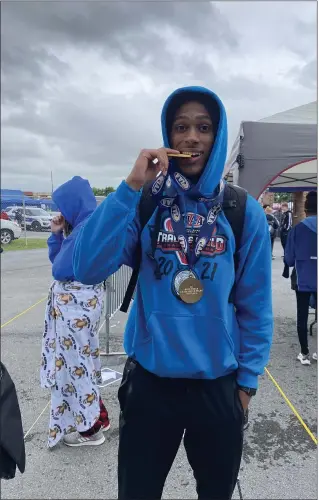  ?? SUBMITTED PHOTO ?? Norristown’s Jaden Brown took a bite out of the competitio­n at the PIAA Championsh­ips, taking first in the Class 3A 100-meter dash.