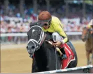  ?? PHOTO CHELSEA DURAND/NYRA ?? Pure Silver at the rail on the way to winning last year’s Adirondack Stakes with John Velazquez aboard at Saratoga Race Course.